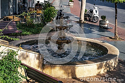 Classic garden fountain in the park at Damlatas Cd and Bostancipinari Cd streets intersection Editorial Stock Photo