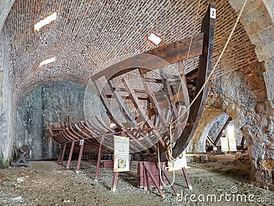 Alanya, Turkey - 30 september, 2019: The wooden frame of an ancient floating ship in the form of a museum exhibit in old Editorial Stock Photo