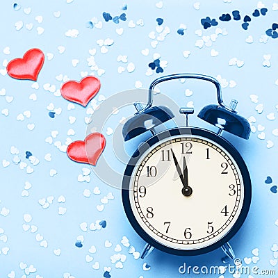 Alarm clock and hearts Stock Photo