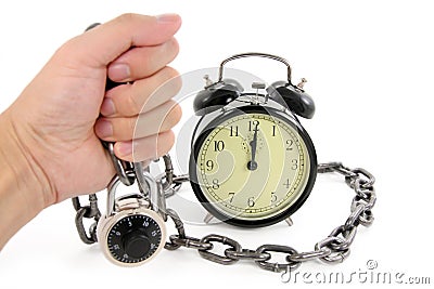 Alarm clock and chain Stock Photo