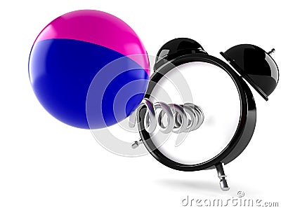 Alarm clock with paintball ball Stock Photo