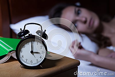 Alarm clock showing 3 a.m. Stock Photo