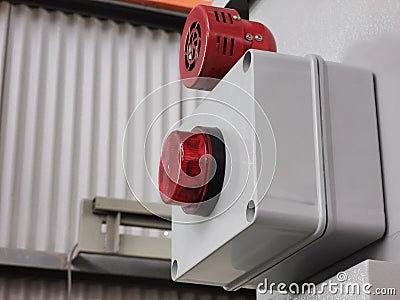 Alarm siren with strobe light mount on electrical cabinet. Stock Photo