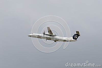 Alaska Airlines Dash 8 at Seattle Airport, USA Editorial Stock Photo