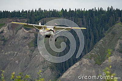 An Alaska bush plane prepares for landing at the Chitina Alaska Airport Editorial Stock Photo