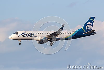 Alaska SkyWest Airlines Embraer 175 airplane at Los Angeles Airport in the United States Editorial Stock Photo