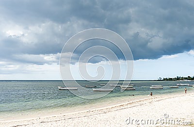 ALBION, MAURITIUS - DECEMBER 05, 2015: Beach in Mauritius with Yachts and Indian Ocean. Local People and Boats Editorial Stock Photo