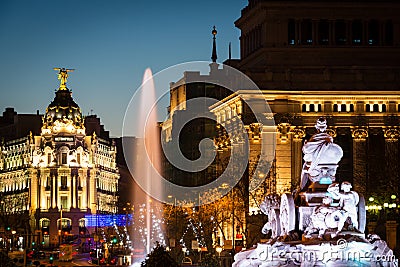 Alcala and Cibeles fountain in Madrid at dusk Editorial Stock Photo