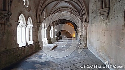 AlcobaÃ§a Monastery Hallway with light at end Stock Photo