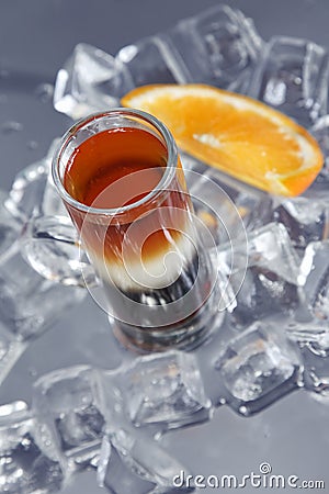 Alcohol Cocktail on ice cube background Stock Photo