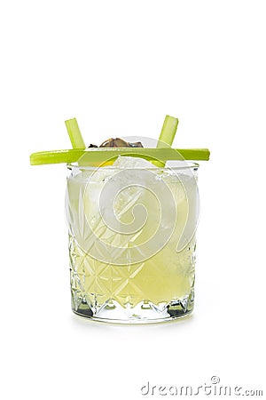 Alcohol Cocktail with Pineaple and Celery in a Crystal Glass Iso Stock Photo