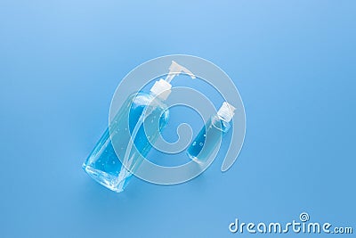 Alcohol hand gel sanitizer in big pump bottle and small travel bottle Stock Photo