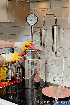 Alcohol mashine. Cooking home-brew Stock Photo