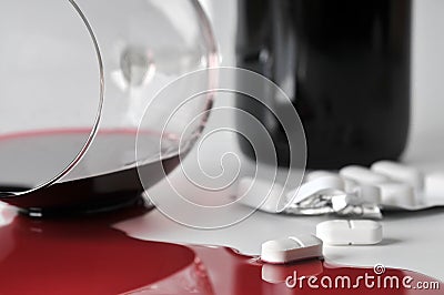 Alcohol and pills Stock Photo