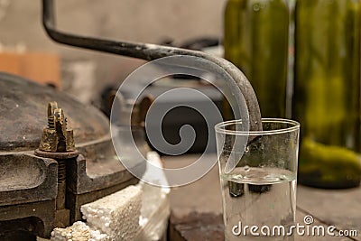 Alcohol production in home conditions. Accessories for the production of homemade moonshine Stock Photo