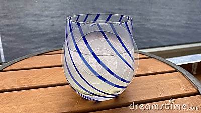 An alcoholic beverage of vodka and lemonade on a table aboard a cruise ship balcony Stock Photo