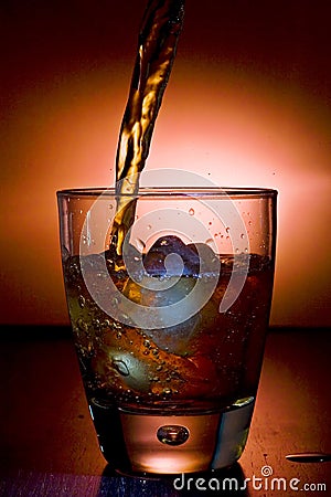 Alcoholic beverage whith ice cubes Stock Photo