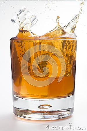 Alcoholic beverage whith ice cubes Stock Photo