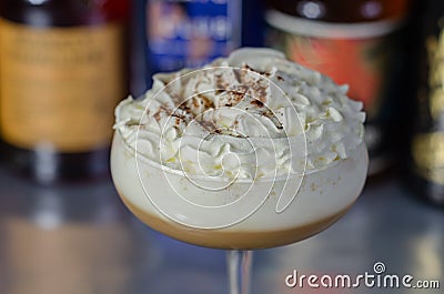 Alcoholic coffee cocktail with a nutty note and whipped cream Stock Photo