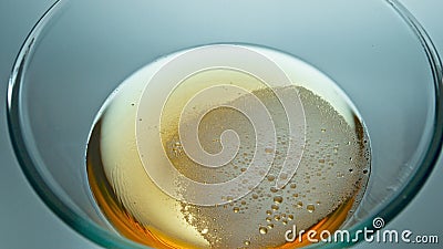 Alcoholic drink foamy surface top view. Carbonated beverage frothing texture Stock Photo