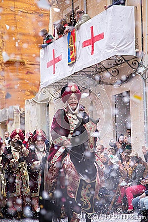 Alcoy, Spain - April 22, 2016: People dressed as Christian legion marching in annual Moros y Cristianos parade in Alcoy, Spain on Editorial Stock Photo