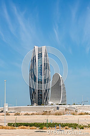 Aldar Headquarters Building and Al Sail Tower in Abu Dhabi Editorial Stock Photo