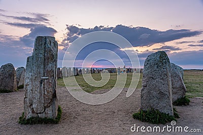 Tourists at the mysterious Ales stones on the Swedish south east coast Editorial Stock Photo