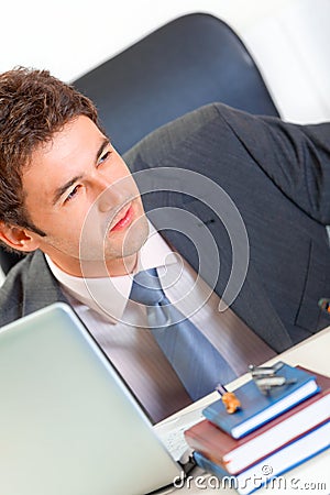 Alert businessman looking in corner. Close-up Stock Photo