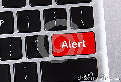 Alert word on red computer keyboard button Stock Photo