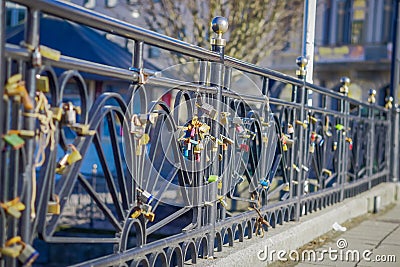 ALESUND, NORWAY, APRIL, 04, 2018: Outdoor view of dozens of padlocks of love on the bridge Editorial Stock Photo