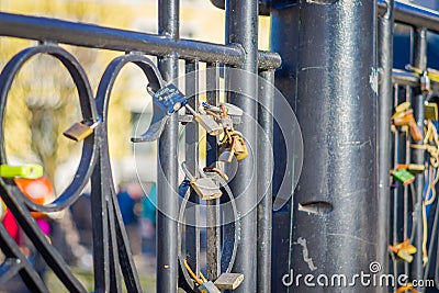 ALESUND, NORWAY, APRIL, 04, 2018: Outdoor view of dozens of padlocks of love on the bridge Editorial Stock Photo