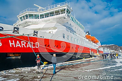 ALESUND, NORWAY - APRIL 04, 2018: Outdoor view of Hurtigruten coastal vessel KONG HARALD, is a daily passenger and Editorial Stock Photo