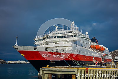 ALESUND, NORWAY - APRIL 04, 2018: Outdoor view of Hurtigruten coastal vessel KONG HARALD, is a daily passenger and Editorial Stock Photo