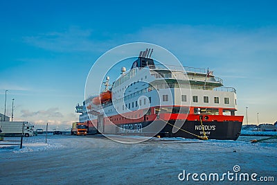 ALESUND, NORWAY - APRIL 04, 2018: Outdoor view of Hurtigruten coastal vessel KONG HARALD, is a daily passenger and Editorial Stock Photo