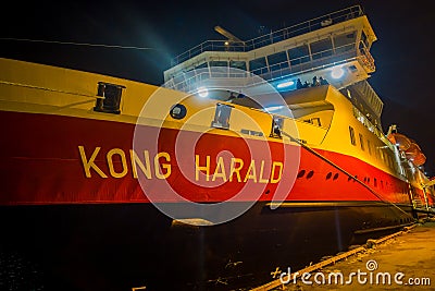 ALESUND, NORWAY - APRIL 04, 2018: Outdoor view of Hurtigruten coastal vessel KONG HARALD, is a daily passenger and Editorial Stock Photo