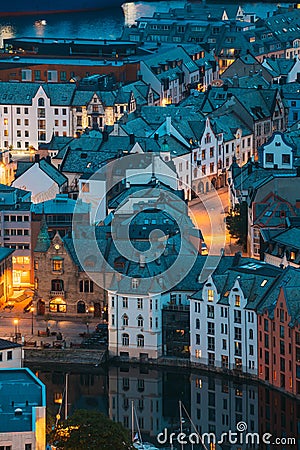 Alesund, Norway. Night View Of Alesund Skyline Cityscape. Historical Center In Summer Evening. Famous Norwegian Stock Photo