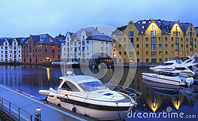 Alesund skyline architecture illuminated at dusk Stock Photo