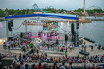 Alexander Delgado and the band by Gente de Zona singing urban music at Seaworld in International Drive area. Editorial Stock Photo