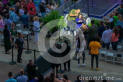 Alexander Delgado by Gente de Zona next to girl taking a selfie at Seaworld in International Drive Area . Editorial Stock Photo