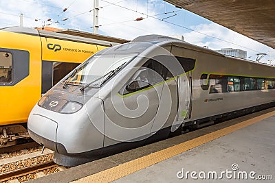 Alfa Pendular high-speed train at Porto Campanha railway station in Portugal public transport transit Editorial Stock Photo