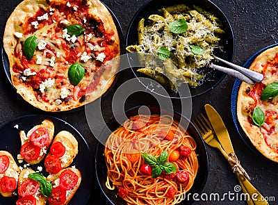 Italian vegetarian platter-pasta,bruschetta and pizza Stock Photo