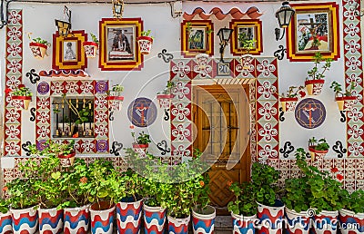 ALICANTE SPAIN- JULY 18 2019: The facade of a typical traditional house in the Santa Cruz district of Alicante. Colored Editorial Stock Photo