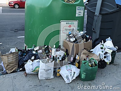 Overloaded trash containers Editorial Stock Photo