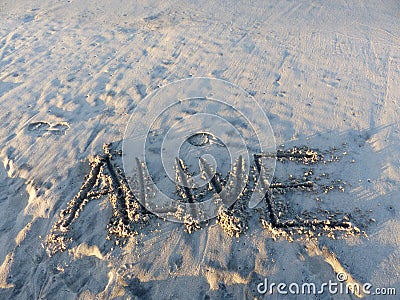 Alive Inspirational Sand Word Stock Photo