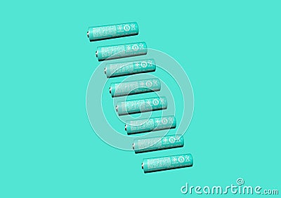 Alkaline AA batteries isolated on light green background. Recycling of rechargeable NiMH batteries Stock Photo