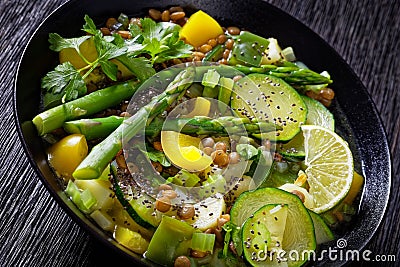 Alkaline green soup in black bowl, top view Stock Photo