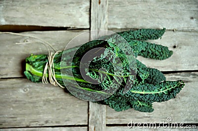 Alkaline, healthy food : kale leaves on a vintage background Stock Photo