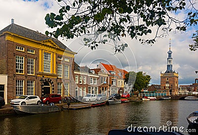 Alkmaar cityscape with Accijnstoren excise tower on bank of Werronkenoord canal Editorial Stock Photo