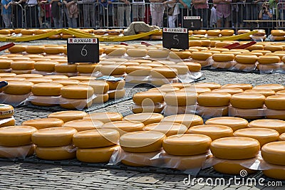 Alkmaar, Netherlands - June 01, 2018: Rows of stacked round yell Editorial Stock Photo