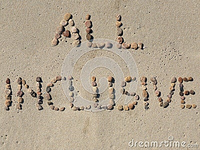 All inclusive text on the beach sand Stock Photo